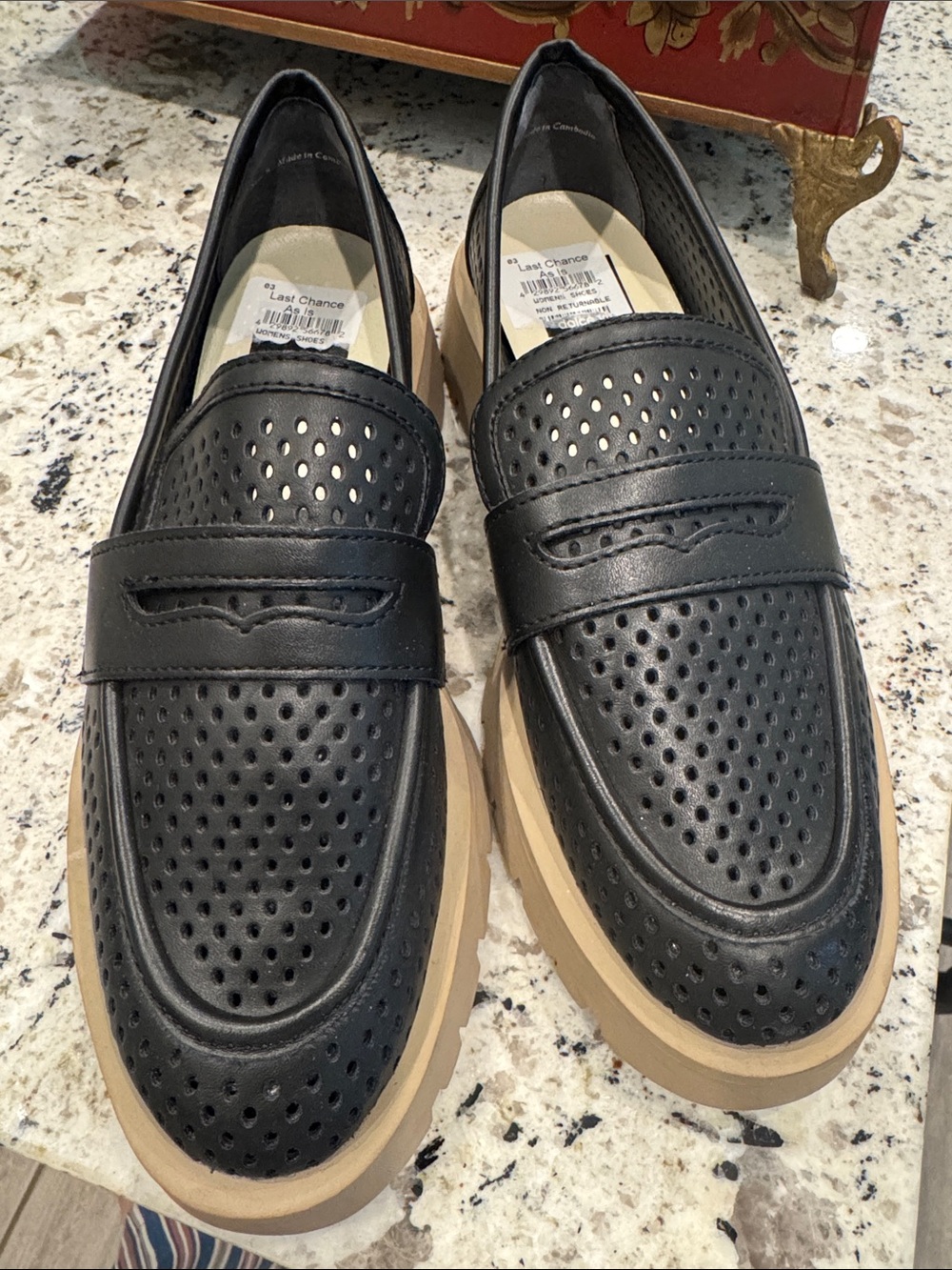 Dolce Vita Black Perforated Penny Loafers with Tan Sole